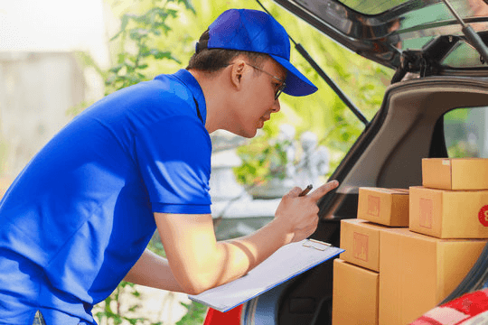 Delivery confirmation beside boxed parcels