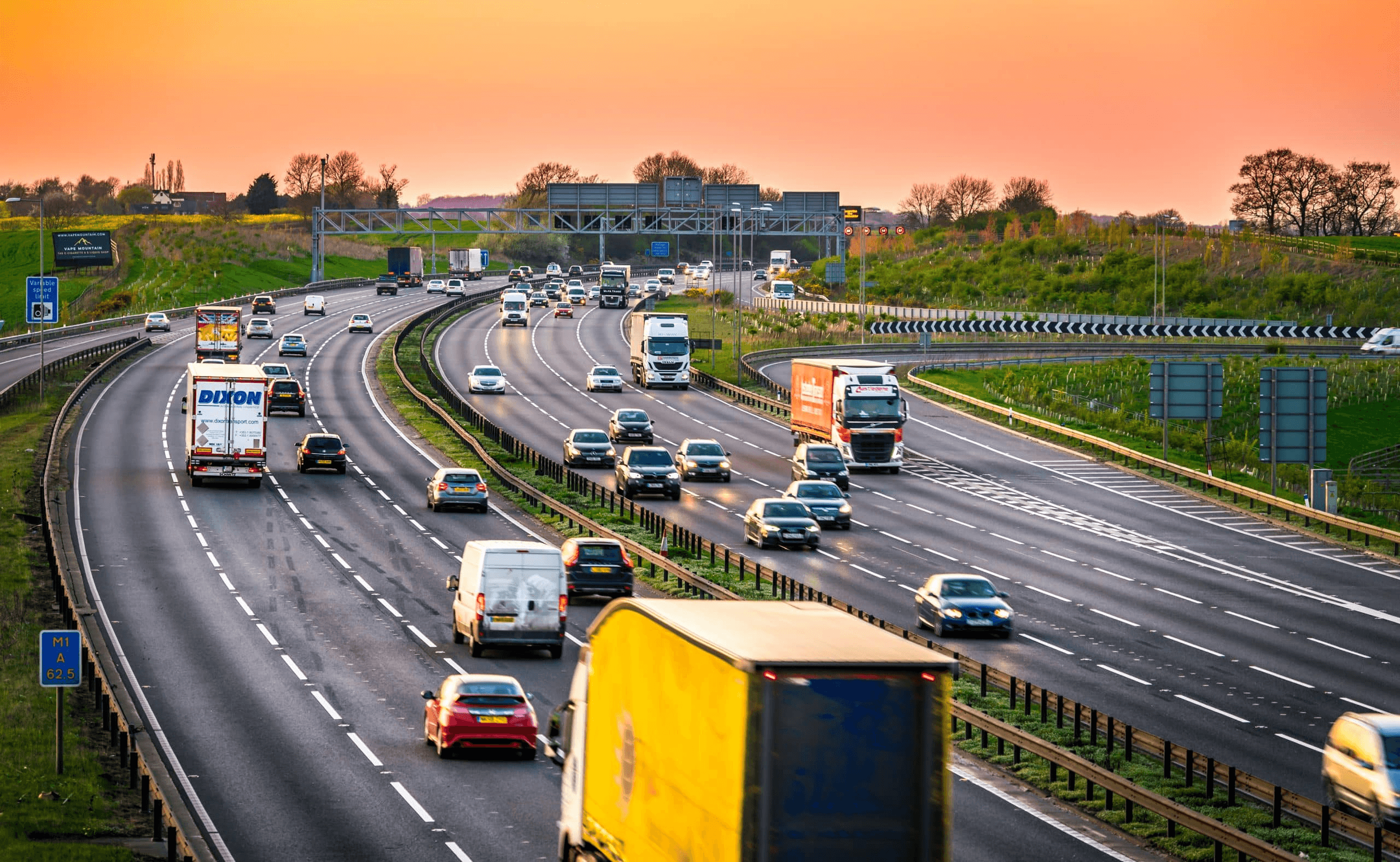 Trucks and vehicles moving along a wide Australian highway